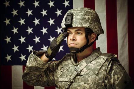 army man saluting the flag