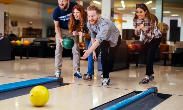 Friends bowling