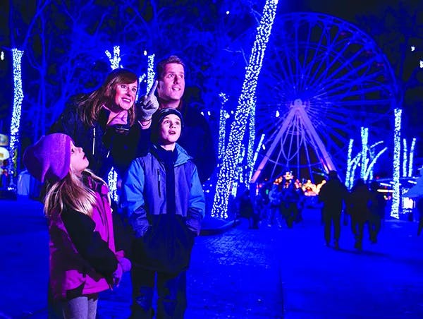 Family enjoys Christmas Lights display