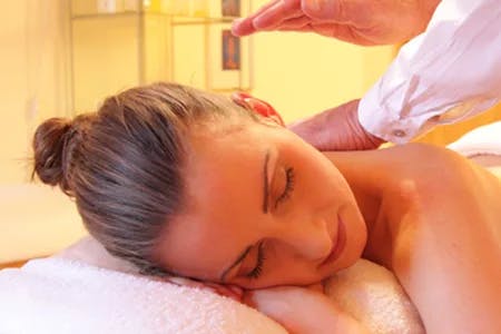 woman receives back massage
